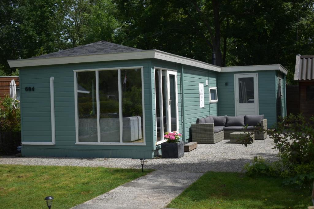 Luxe gezellig chalet aan het water Friesland., Suameer (preços