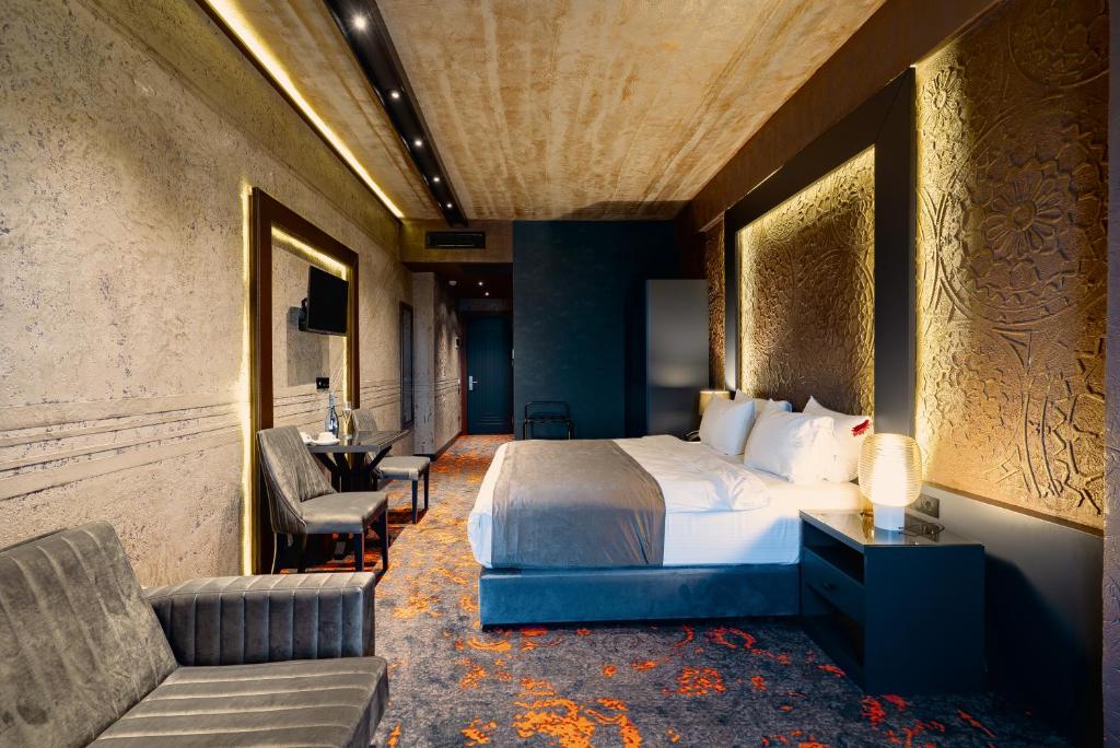 Postel nebo postele na pokoji v ubytování Tapis Rouge Design Boutique Hotel