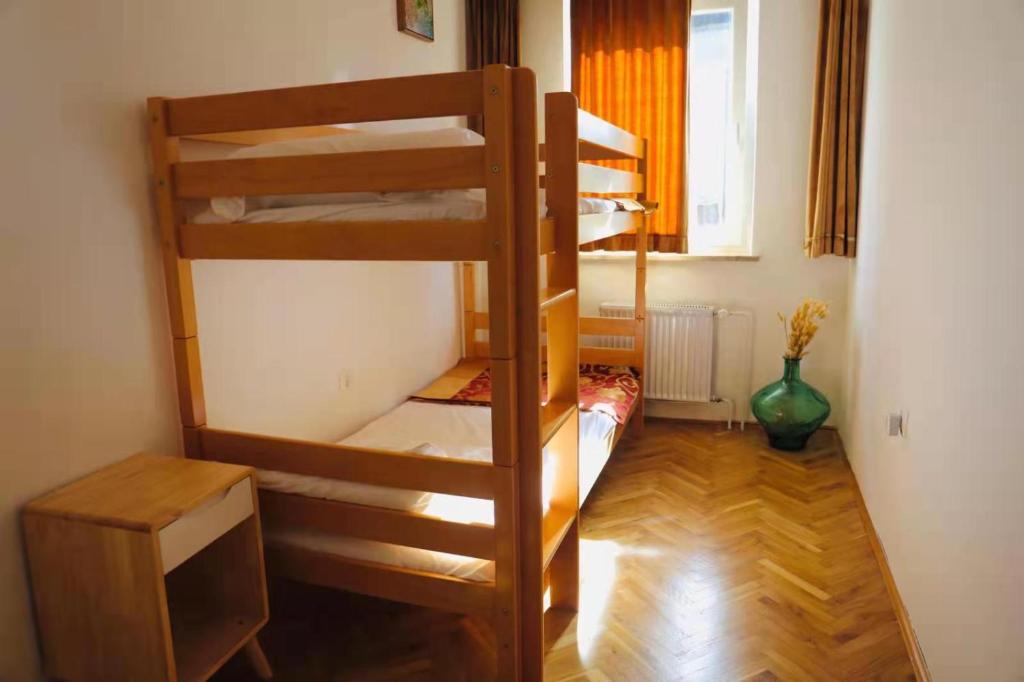 Postel nebo postele na pokoji v ubytování Pension MOYCHI