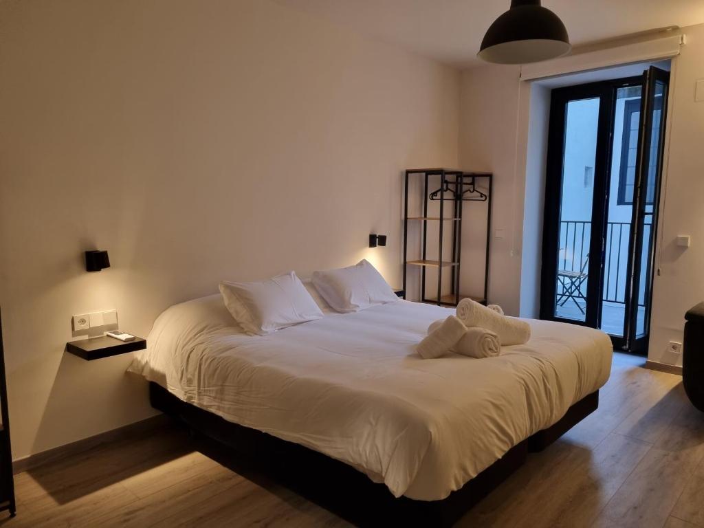 Posteľ alebo postele v izbe v ubytovaní Kabialde Apartamentuak TSS00134