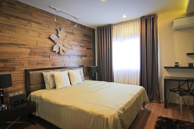 Postel nebo postele na pokoji v ubytování Boracay Suites