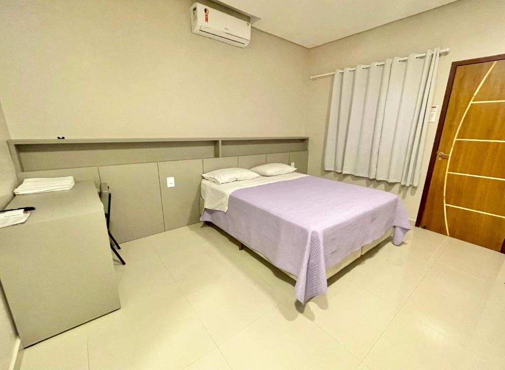 Tempat tidur dalam kamar di Hotel Armenia