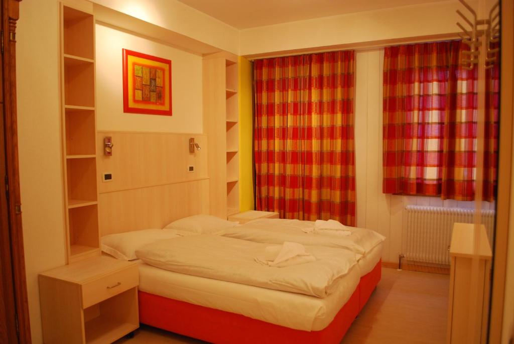 Postel nebo postele na pokoji v ubytování Chalet Helen