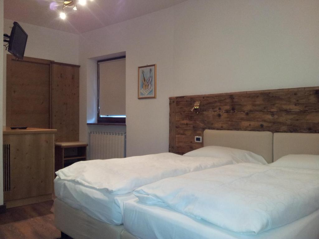 Postel nebo postele na pokoji v ubytování Chalet Helen