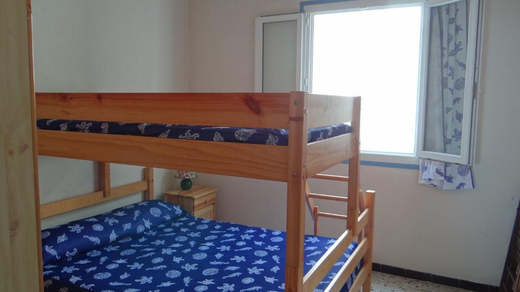 Postel nebo postele na pokoji v ubytování Residence Funtanella