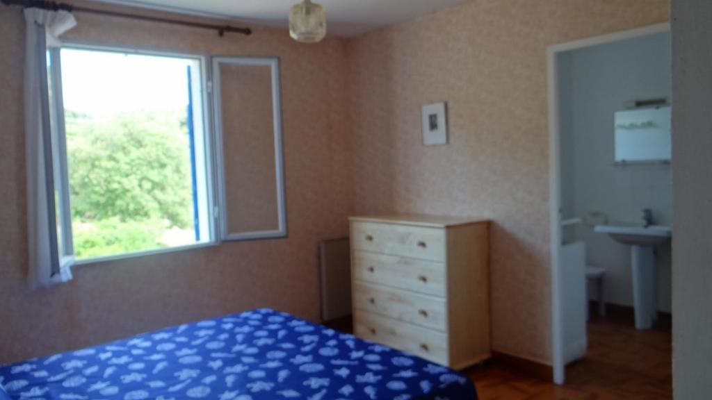 Postel nebo postele na pokoji v ubytování Residence Funtanella