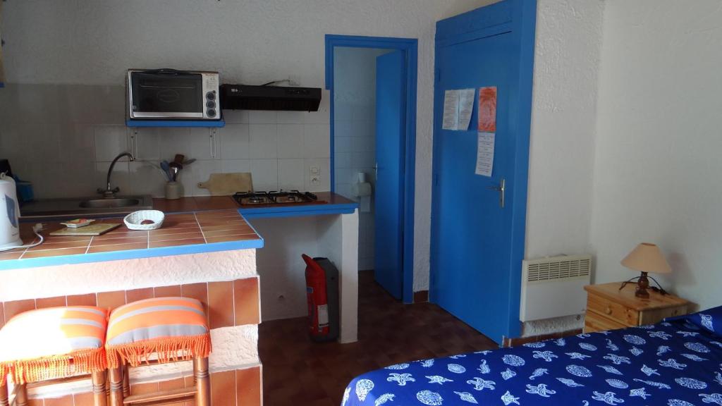 Kuchyň nebo kuchyňský kout v ubytování Residence Funtanella