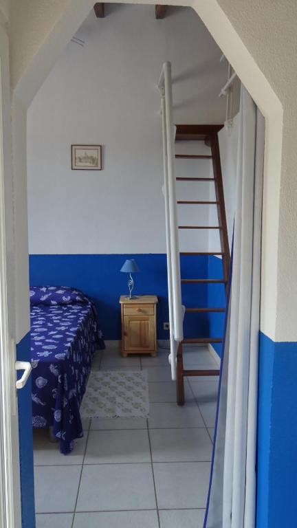 Postel nebo postele na pokoji v ubytování Residence Funtanella