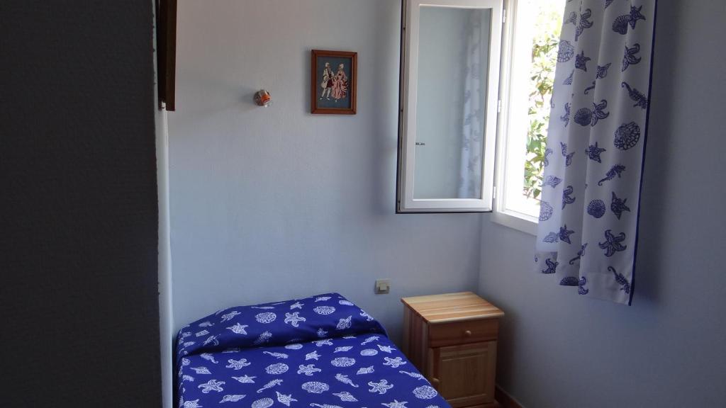 Postel nebo postele na pokoji v ubytování Residence Funtanella