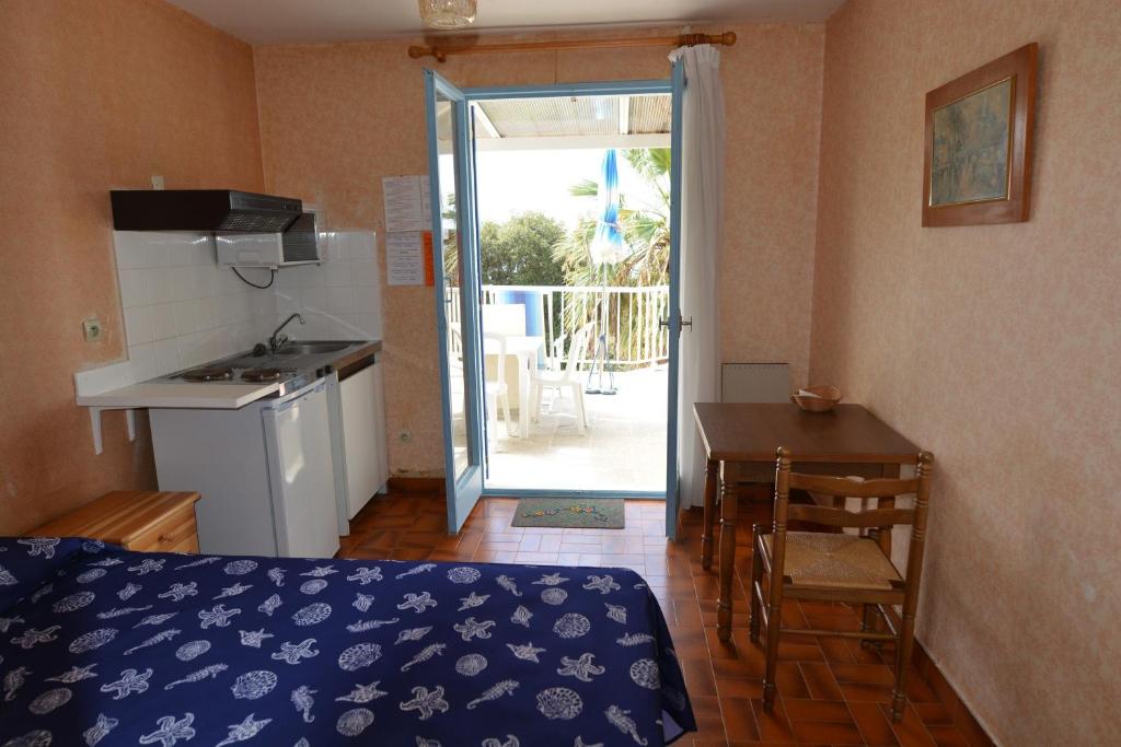 Kuchyň nebo kuchyňský kout v ubytování Residence Funtanella