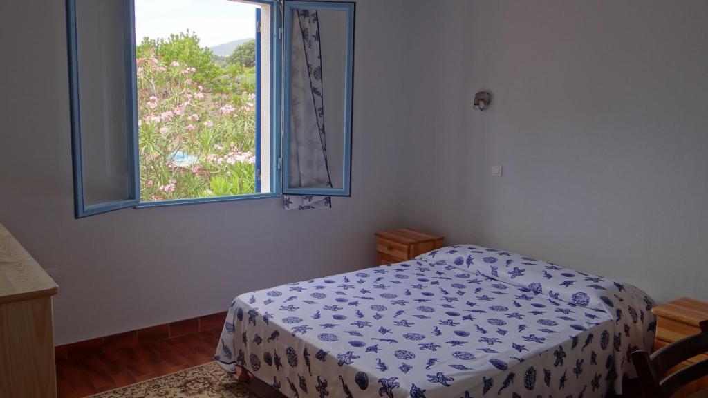 Postel nebo postele na pokoji v ubytování Residence Funtanella