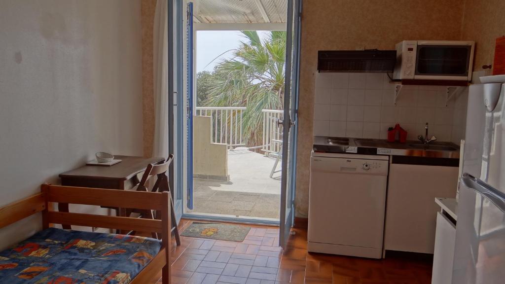 Kuchyň nebo kuchyňský kout v ubytování Residence Funtanella