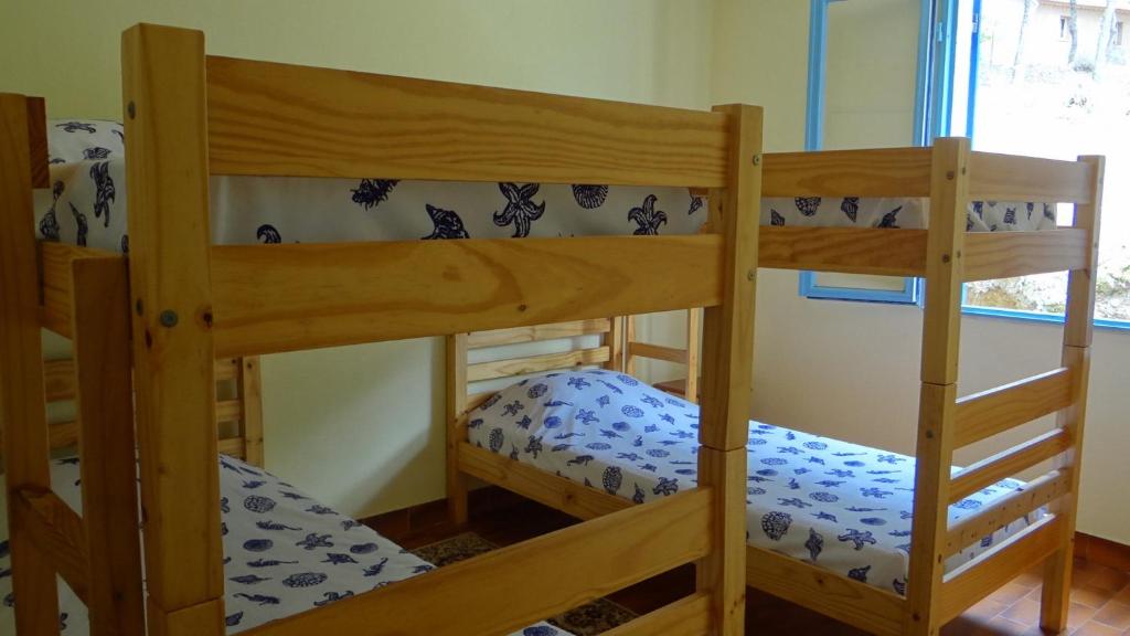 Postel nebo postele na pokoji v ubytování Residence Funtanella