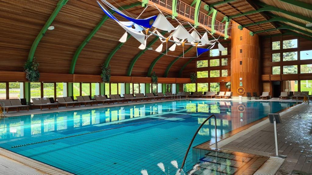 Bazén v ubytovaní Spa Residence Carbona 101, 307 Apartman alebo v jeho blízkosti