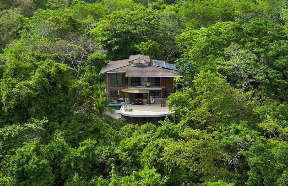 an aerial view of a house in the middle of a forest at Private Home in Montezuma with Ocean View in Montezuma