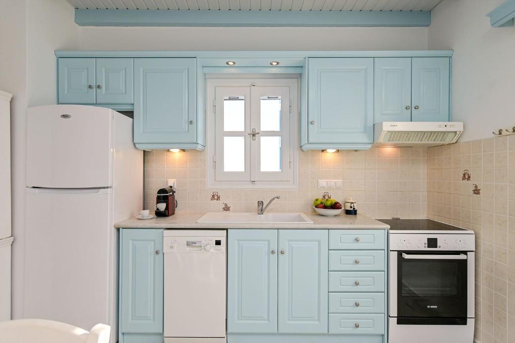 Kuchyň nebo kuchyňský kout v ubytování Naxos Affinity Villas