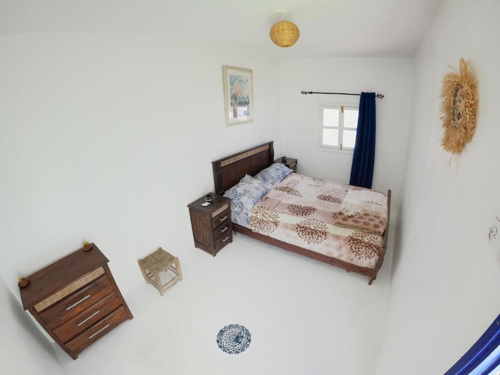 Postel nebo postele na pokoji v ubytování Thayri Hostel