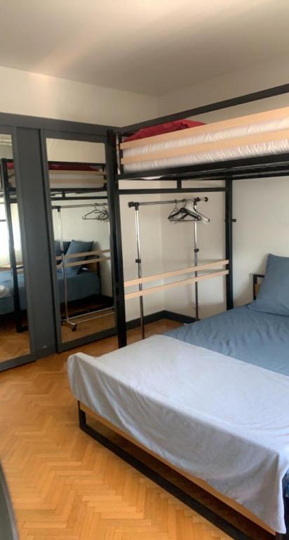 Posteľ alebo postele v izbe v ubytovaní Appartement Lumineux de 90 m2 situé en centre ville