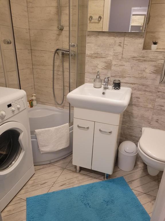 Ванна кімната в Apartament Centrum Chmielna