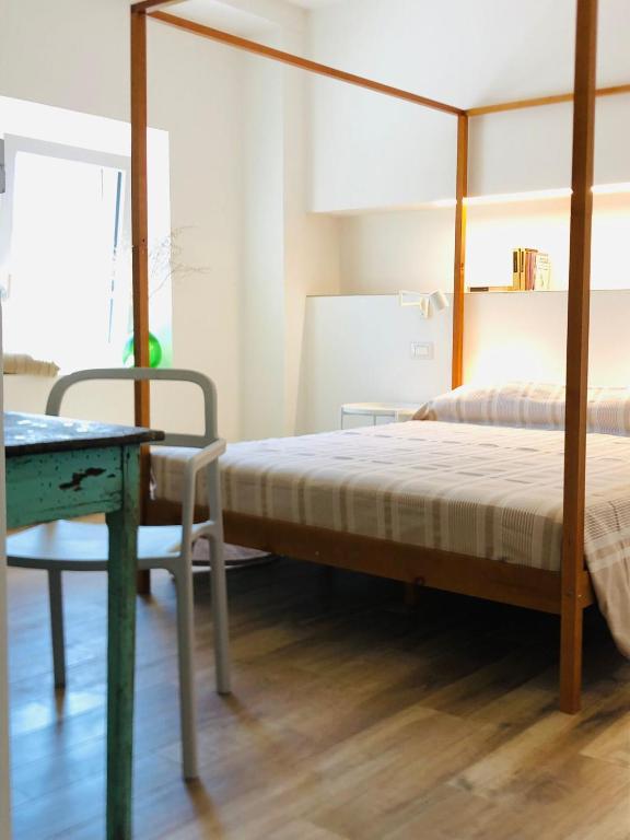Postel nebo postele na pokoji v ubytování ARCADIA - SIROLO