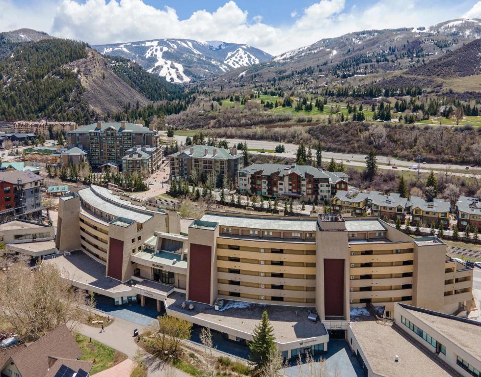 an aerial view of the resort with mountains in the background at The Seasons Unit 205 in Avon