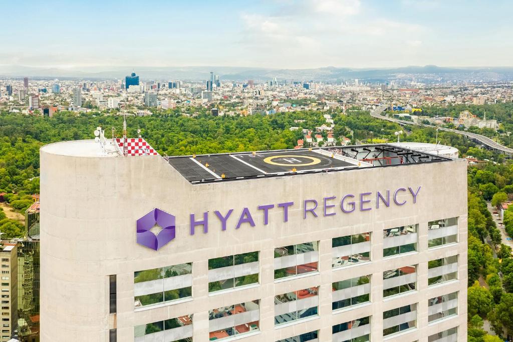 a hyatt regency sign on top of a building at Hyatt Regency Mexico City in Mexico City