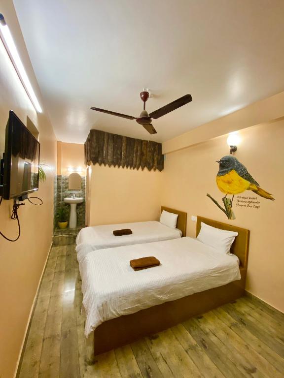Postel nebo postele na pokoji v ubytování Mingo Guest House