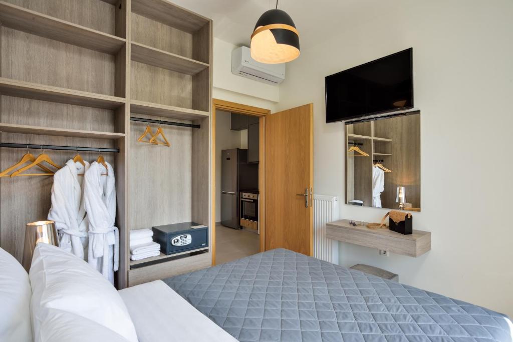 Łóżko lub łóżka w pokoju w obiekcie Elia Residences