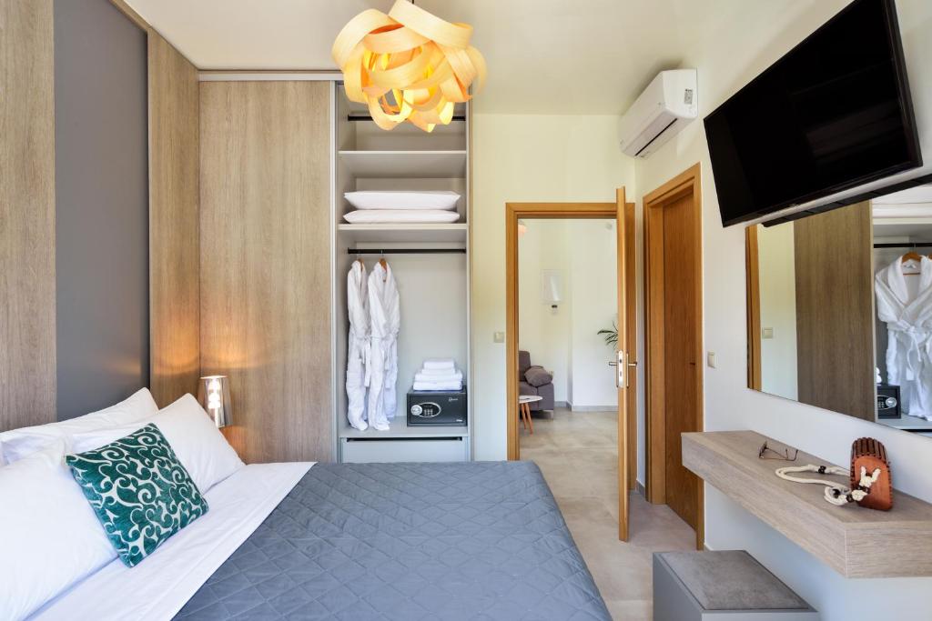 Łóżko lub łóżka w pokoju w obiekcie Elia Residences