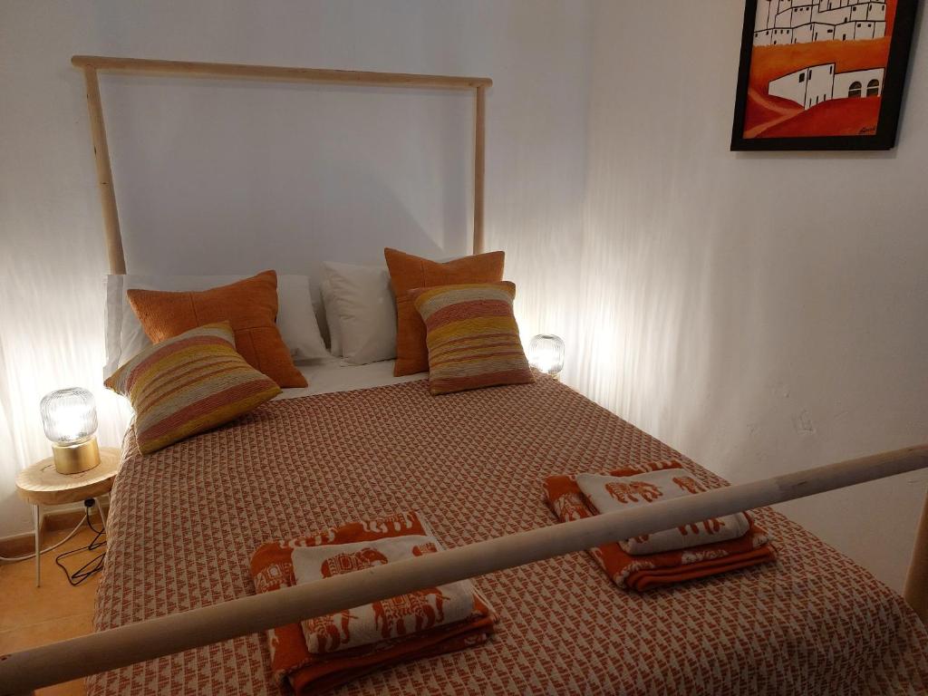 Łóżko lub łóżka w pokoju w obiekcie Bohemian 2 bed Apartamento Amarillo