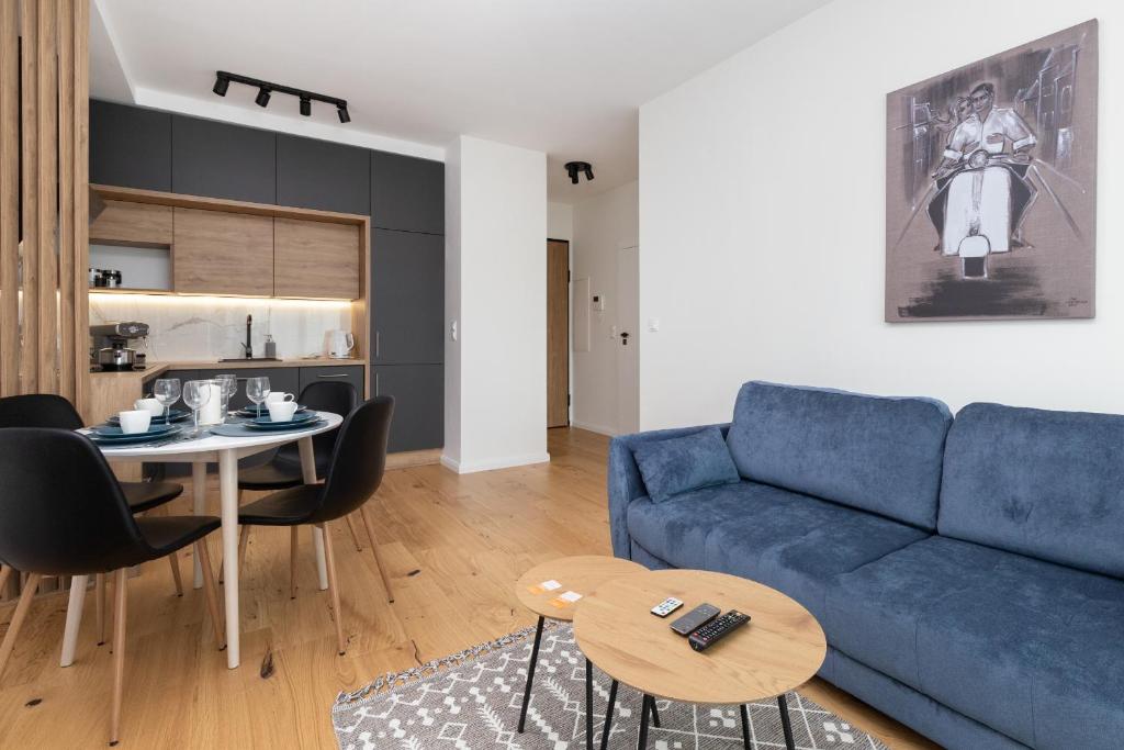 Posedenie v ubytovaní Apartament VESPA Beach Nearby by Noclegi Renters