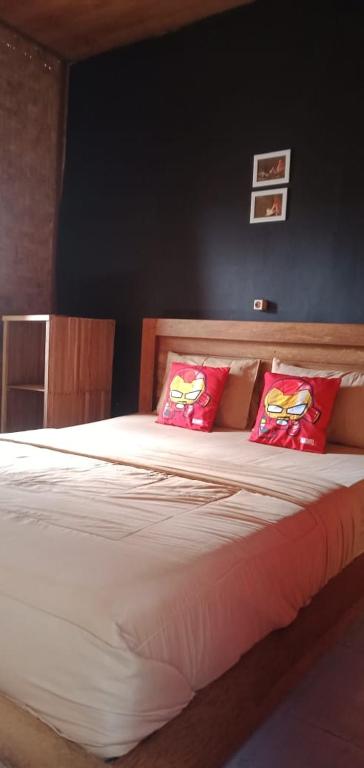Postel nebo postele na pokoji v ubytování Dragonfly Hostel and Homestay