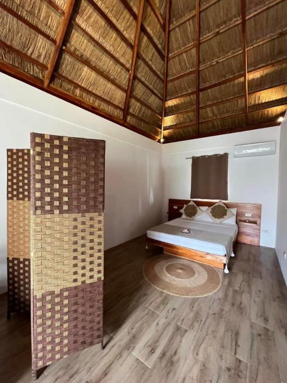 Postel nebo postele na pokoji v ubytování SAMADHI Resort & Hydrospa Panglao