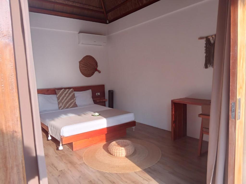 Postel nebo postele na pokoji v ubytování SAMADHI Resort & Hydrospa Panglao