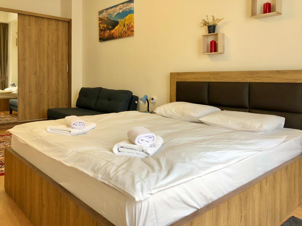 Postel nebo postele na pokoji v ubytování GVC 2-room 116 New Gudauri