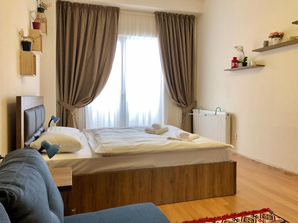 Postel nebo postele na pokoji v ubytování GVC 2-room 116 New Gudauri