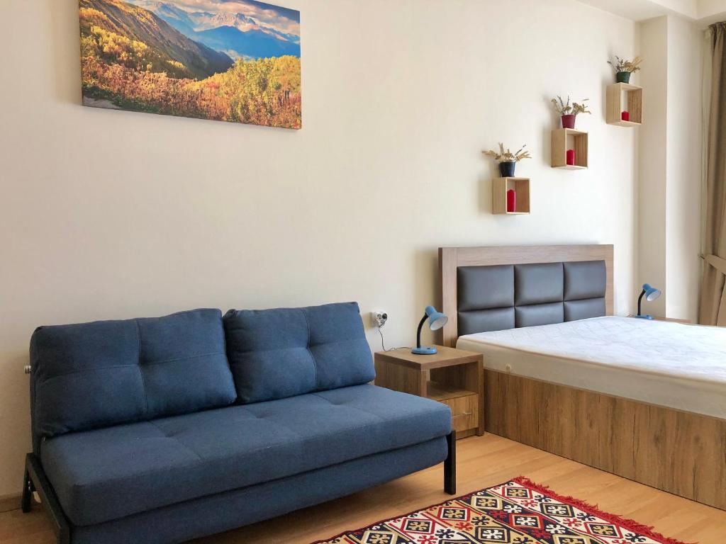 Postel nebo postele na pokoji v ubytování GVC 2-room 116 New Gudauri