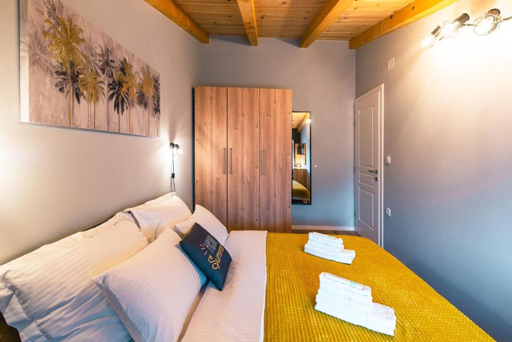 Postel nebo postele na pokoji v ubytování DreamStone Kolan