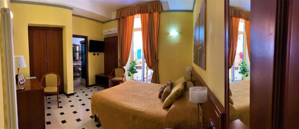 Postel nebo postele na pokoji v ubytování Actor Hotel