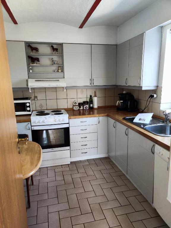 Kuchyň nebo kuchyňský kout v ubytování Naturperlen