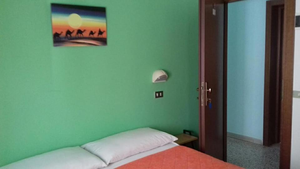 Postel nebo postele na pokoji v ubytování Hotel Acapulco sul mare