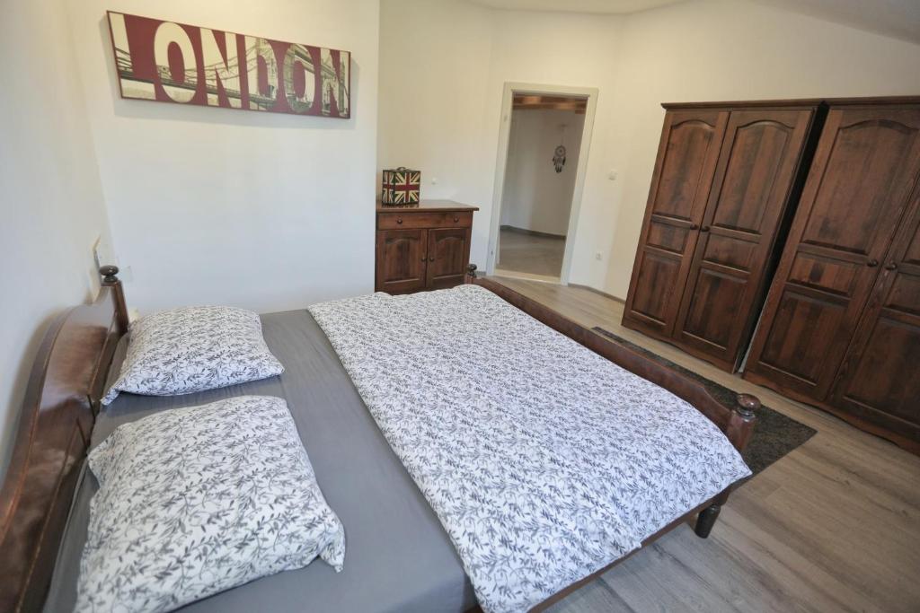 Postel nebo postele na pokoji v ubytování Apartment Tugare