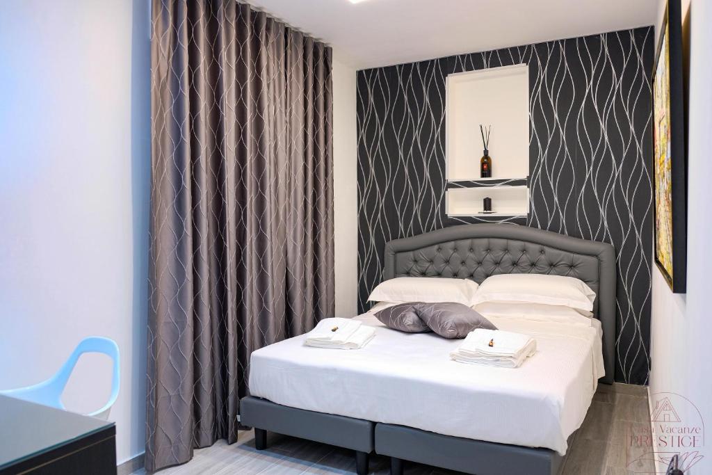 Postel nebo postele na pokoji v ubytování PRESTIGE casa vacanze