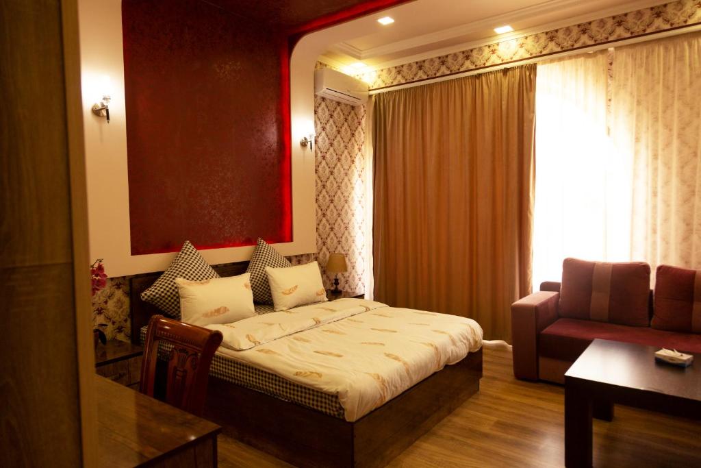 Postel nebo postele na pokoji v ubytování Hotel Felisa Gyumri