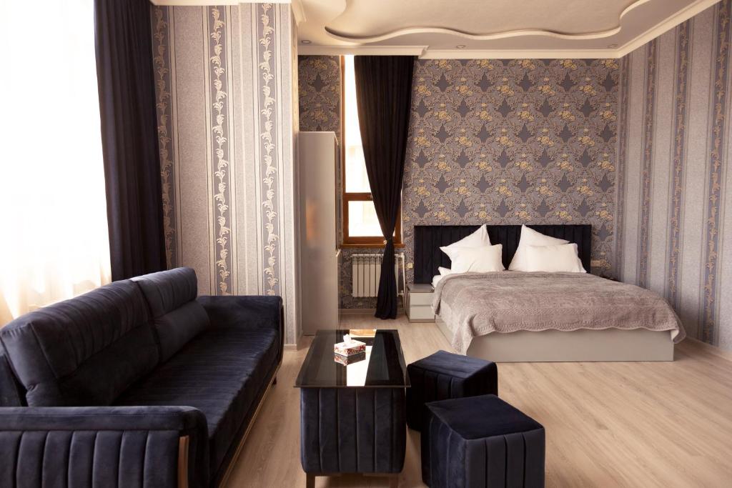 Postel nebo postele na pokoji v ubytování Hotel Felisa Gyumri