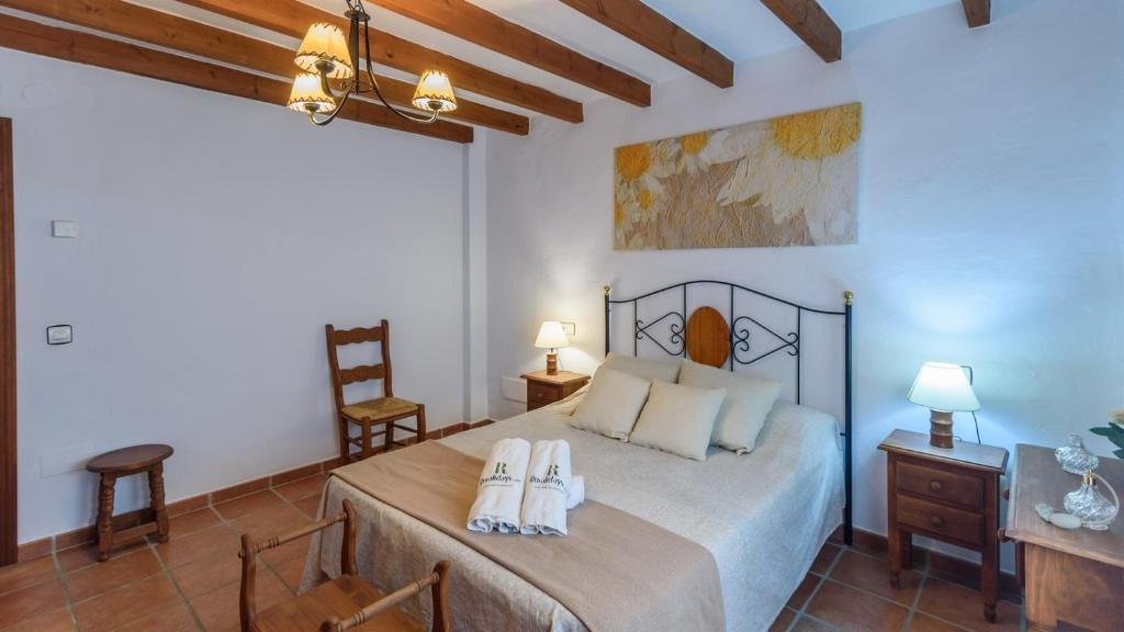 Postel nebo postele na pokoji v ubytování Casa Las Esparragueras Competa by Ruralidays
