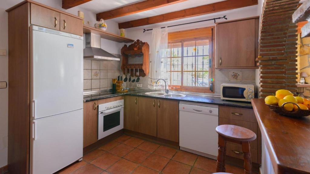 Kuchyň nebo kuchyňský kout v ubytování Casa Las Esparragueras Competa by Ruralidays