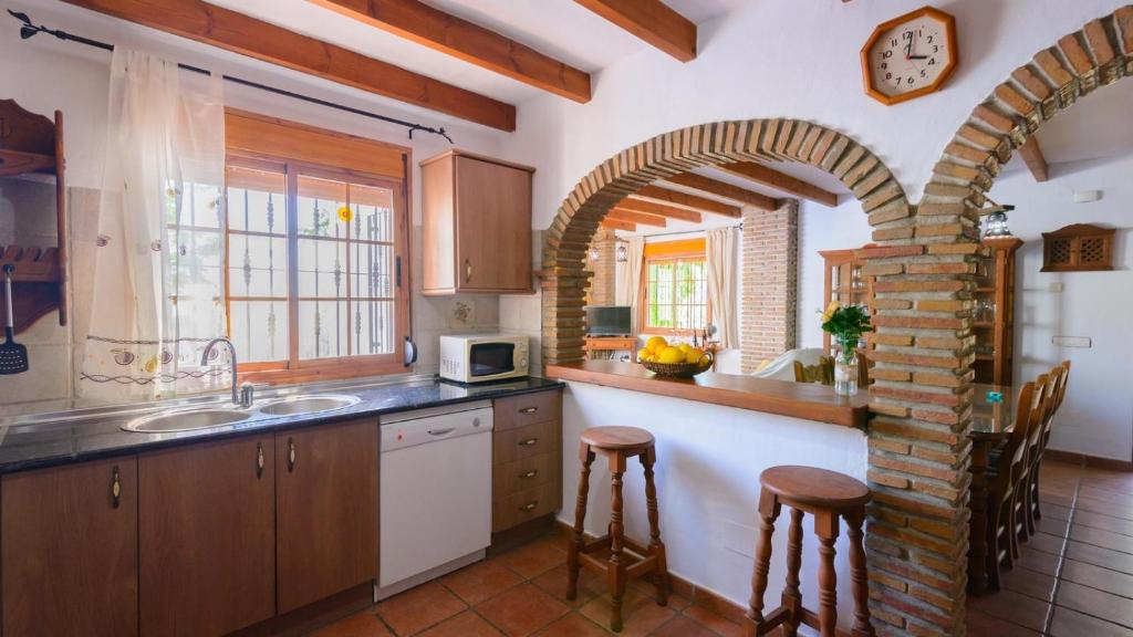 Kuchyň nebo kuchyňský kout v ubytování Casa Las Esparragueras Competa by Ruralidays