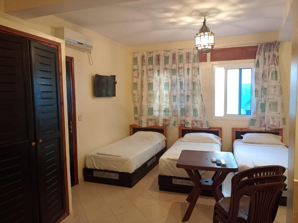 Katil atau katil-katil dalam bilik di Dar Bouanani