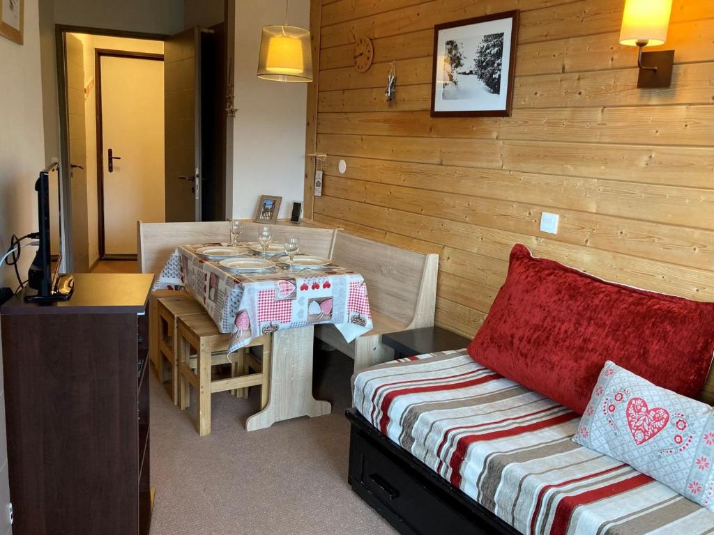 a room with a table and a couch and a table and a tableablish at Appartement Avoriaz, 2 pièces, 4 personnes - FR-1-634-79 in Morzine